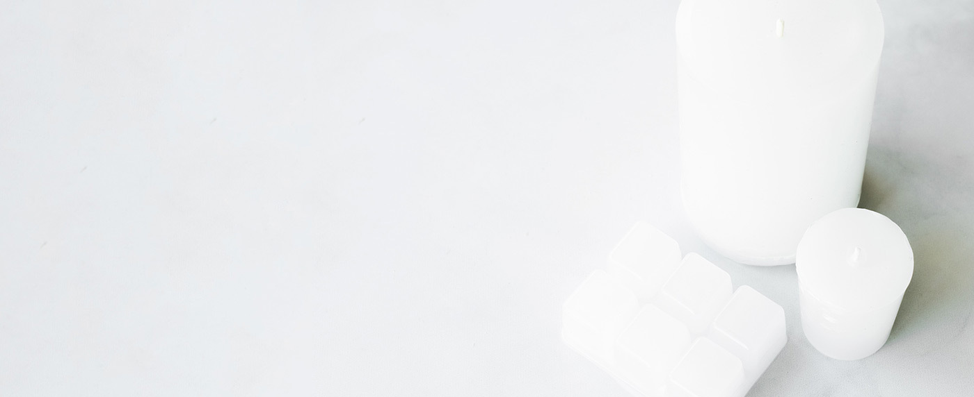 Paraffin pillar candle, votive candle, and wax melts.