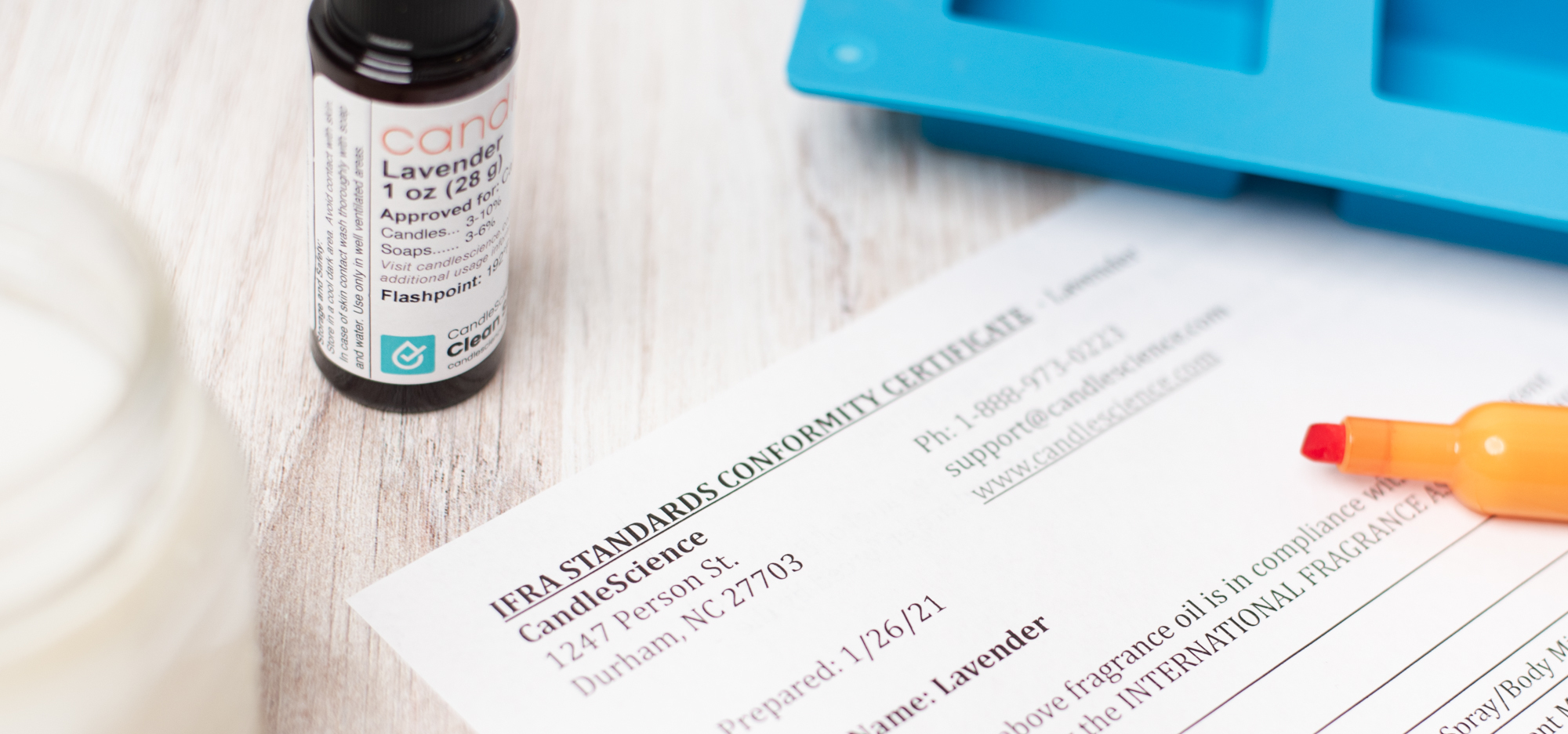 A close-up view of an IFRA certificate for a CandleScience fragrance oil