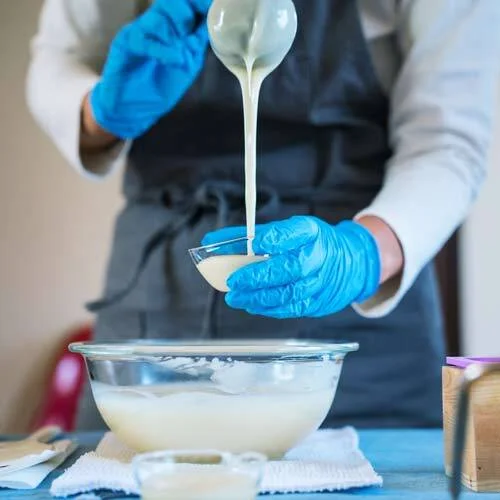 Pouring cold process soap.